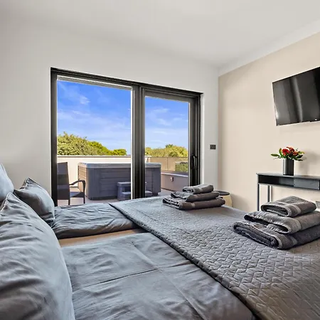 Malena Near Medulin For 8 Persons With 51 M2 Heated Pool, Wellness & Beautiful Sea View *